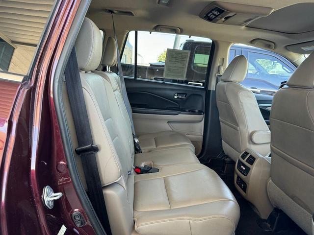 Photo of 2016 Dark Cherry Pearl Honda Pilot