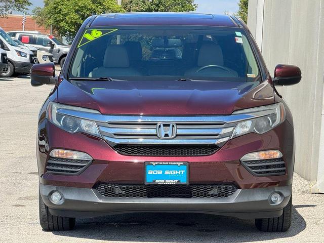 Photo of 2016 Dark Cherry Pearl Honda Pilot