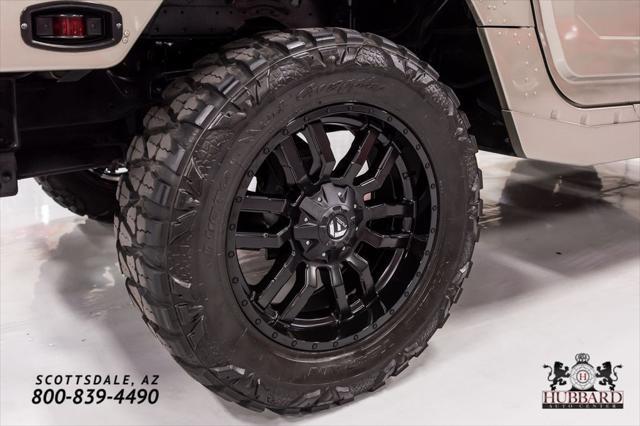 Photo of 2000 Metallic Pewter Am General Hummer