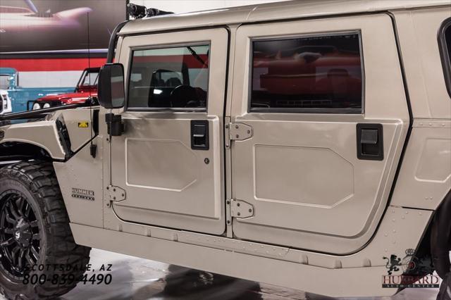 Photo of 2000 Metallic Pewter Am General Hummer