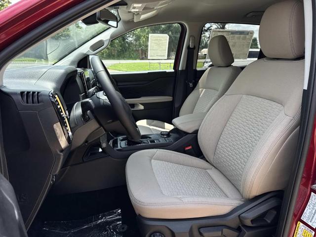 Photo of 2025 Ruby Red Metallic Tinted Clearcoat Ford Ranger