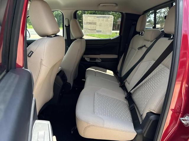 Photo of 2025 Ruby Red Metallic Tinted Clearcoat Ford Ranger