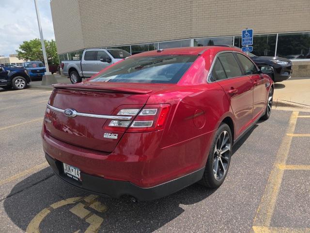 Photo of 2016 Ruby Red Metallic Ford Taurus