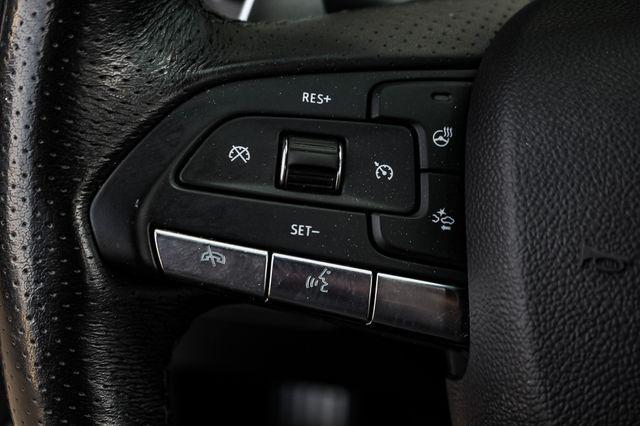Photo of 2022 Summit White Cadillac CT4