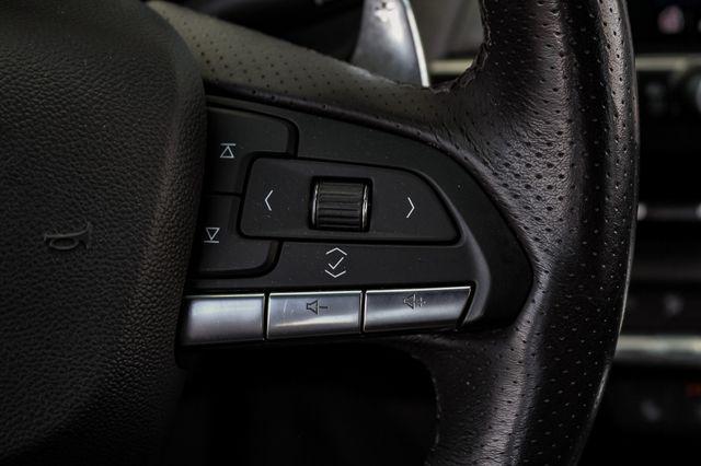 Photo of 2022 Summit White Cadillac CT4