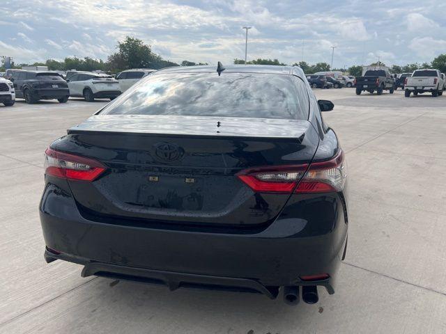 Photo of 2023 Midnight Black Metallic Toyota Camry
