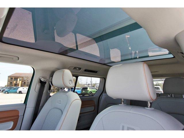 Photo of 2025 Mahi Green Metallic - Candy White Volkswagen ID. Buzz