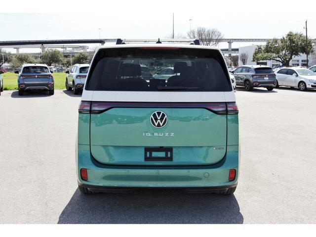 Photo of 2025 Mahi Green Metallic - Candy White Volkswagen ID. Buzz