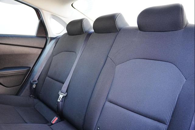 Photo of 2021 Currant Red Kia Forte