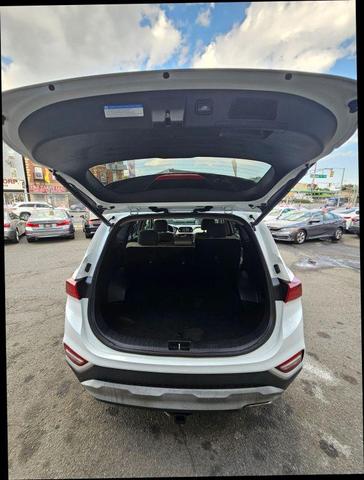 Photo of 2019 White Hyundai SANTA FE