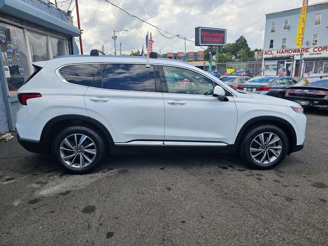 Photo of 2019 White Hyundai SANTA FE