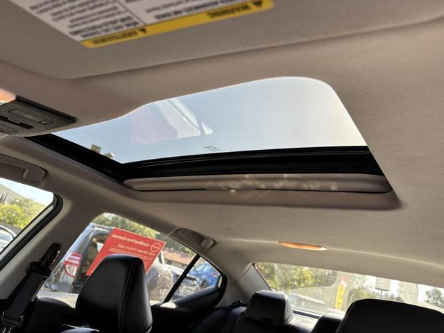 Photo of 2023 Pearl White Tricoat Nissan Altima