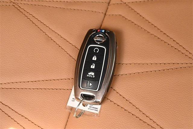 Photo of 2021 Aspen White Tricoat Nissan Sentra