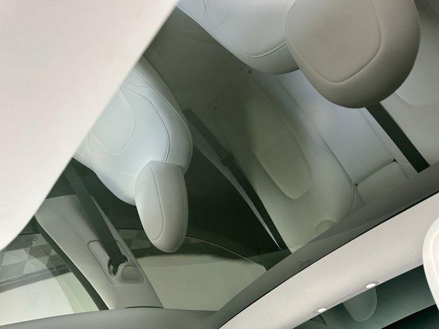Photo of 2023 Pearl White Multi-Coat Tesla Model 3