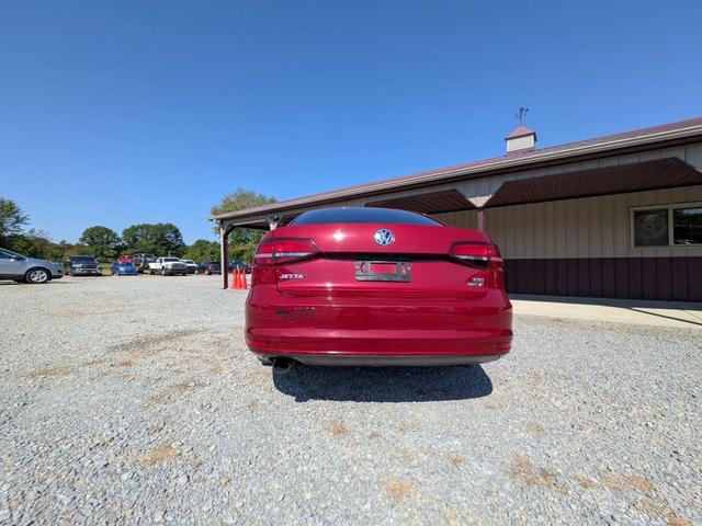Photo of 2018 Cardinal Red Metallic Volkswagen Jetta