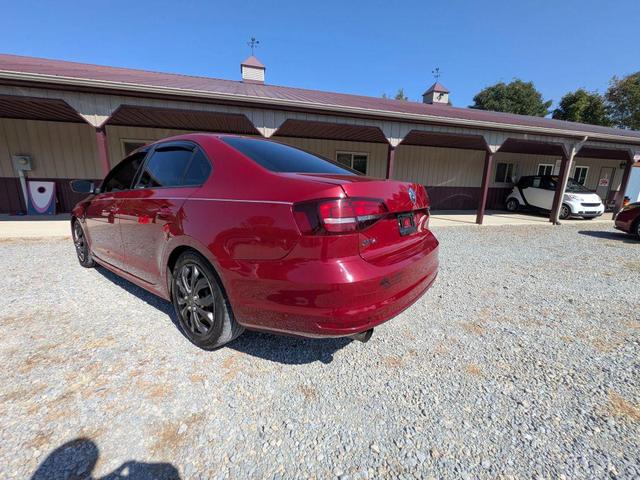 Photo of 2018 Cardinal Red Metallic Volkswagen Jetta