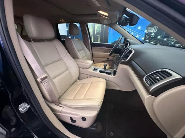 Photo of 2015 Black Forest Green Pearlcoat Jeep Grand Cherokee