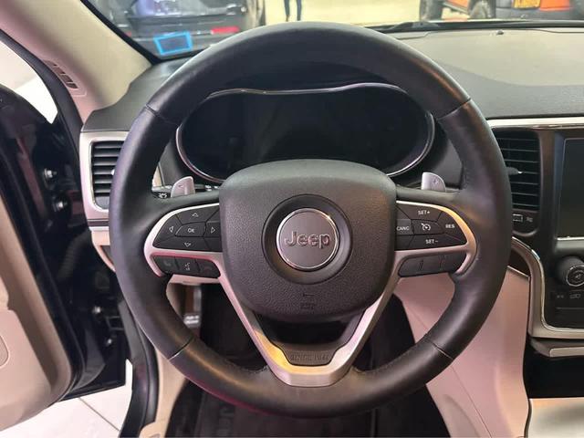 Photo of 2015 Black Forest Green Pearlcoat Jeep Grand Cherokee