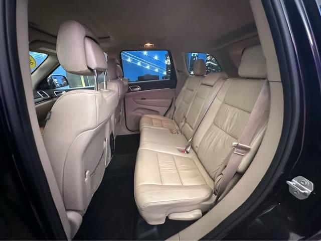 Photo of 2015 Black Forest Green Pearlcoat Jeep Grand Cherokee