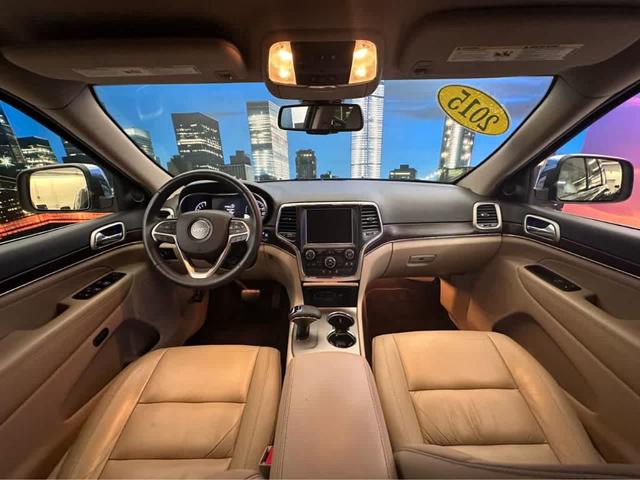 Photo of 2015 Black Forest Green Pearlcoat Jeep Grand Cherokee
