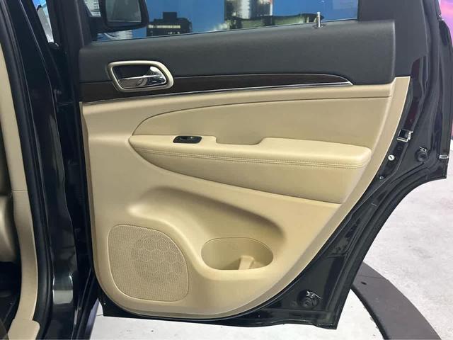 Photo of 2015 Black Forest Green Pearlcoat Jeep Grand Cherokee