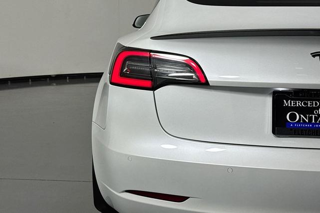 Photo of 2021 PEARL WHITE Tesla Model 3