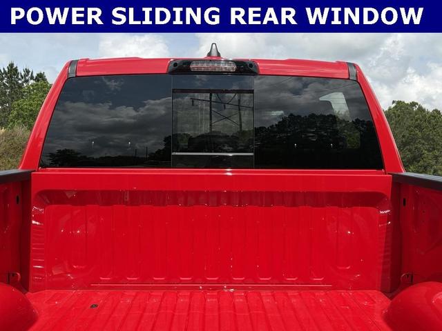 Photo of 2025 Flame Red Clearcoat RAM 1500