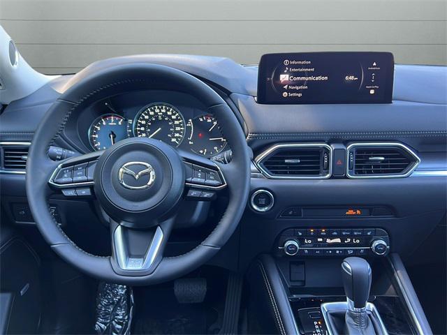 Photo of 2025 Deep Crystal Blue Mica Mazda CX-5