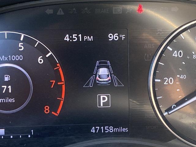 Photo of 2022 Aspen White Tricoat/Super Black Nissan Kicks