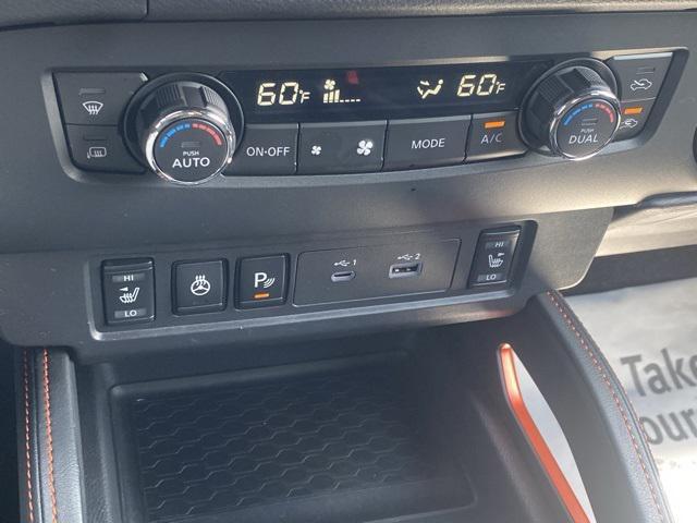 Photo of 2022 Tactical Green Metallic Nissan Frontier