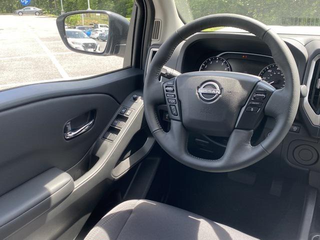 Photo of 2025 Glacier White Nissan Frontier