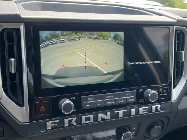 Photo of 2025 Glacier White Nissan Frontier
