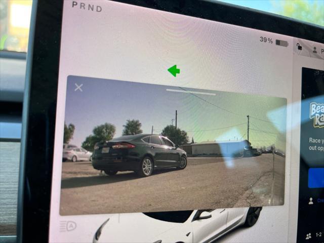 Photo of 2021 Pearl White Multi-Coat Tesla Model 3