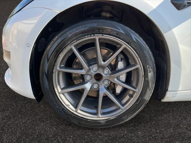 Photo of 2021 Pearl White Multi-Coat Tesla Model 3