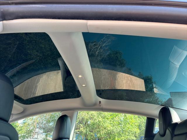 Photo of 2021 Pearl White Multi-Coat Tesla Model 3