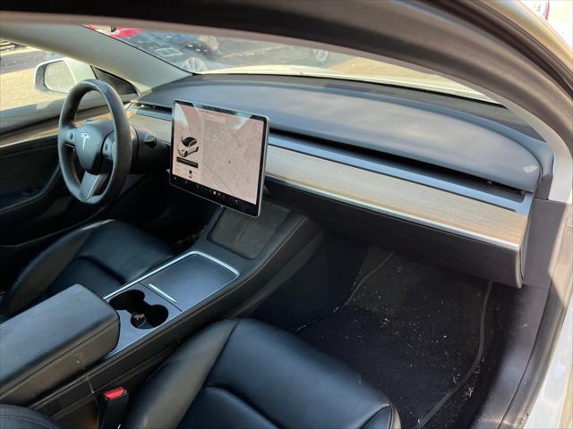 Photo of 2021 Pearl White Multi-Coat Tesla Model 3