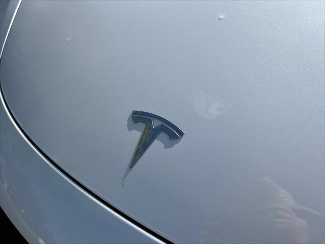 Photo of 2021 Pearl White Multi-Coat Tesla Model 3
