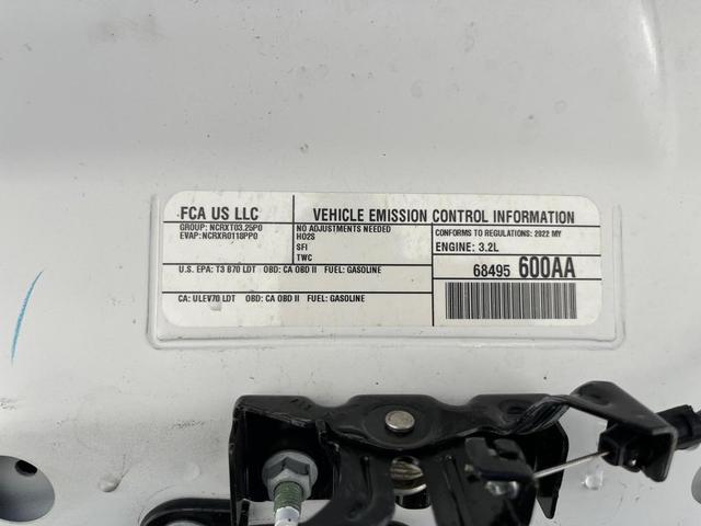 Photo of 2022 Bright White Clearcoat Jeep Cherokee