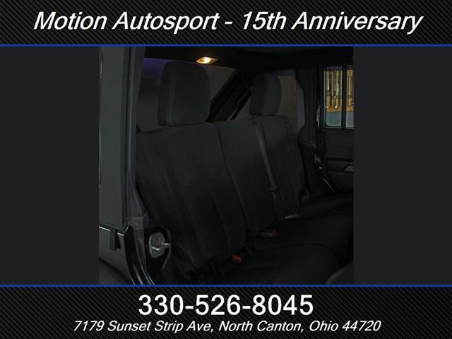 Photo of 2013 Black Clear Coat Jeep Wrangler Unlimited