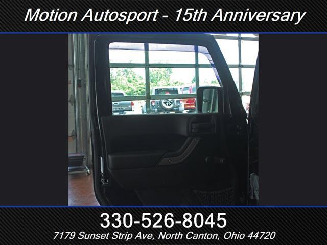 Photo of 2013 Black Clear Coat Jeep Wrangler Unlimited