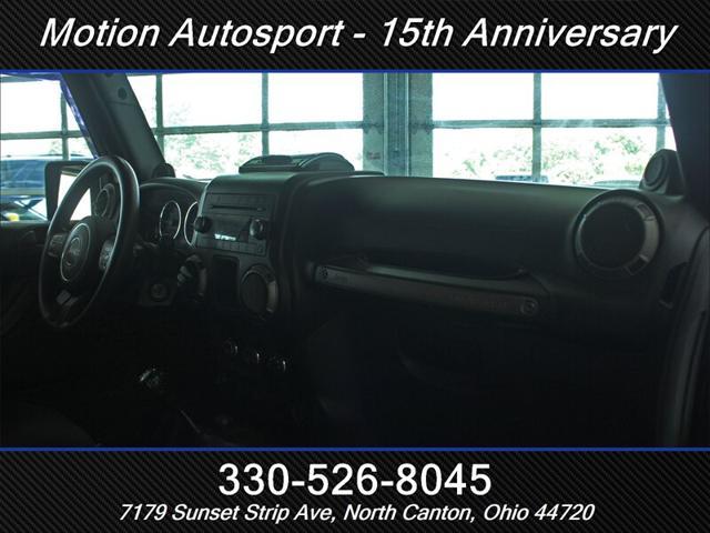 Photo of 2013 Black Clear Coat Jeep Wrangler Unlimited