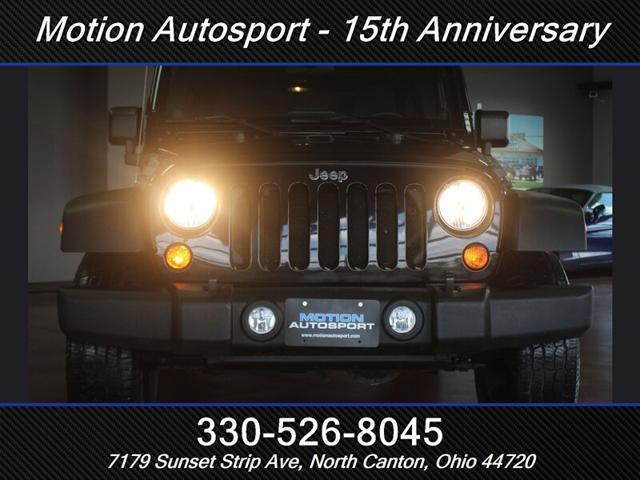 Photo of 2013 Black Clear Coat Jeep Wrangler Unlimited