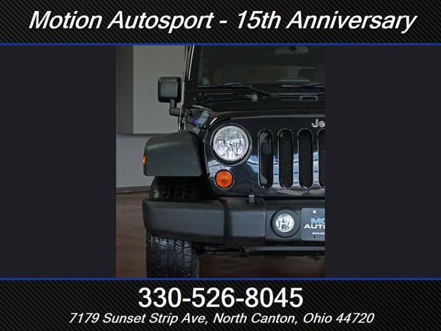 Photo of 2013 Black Clear Coat Jeep Wrangler Unlimited