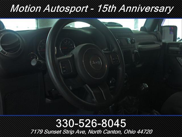 Photo of 2013 Black Clear Coat Jeep Wrangler Unlimited