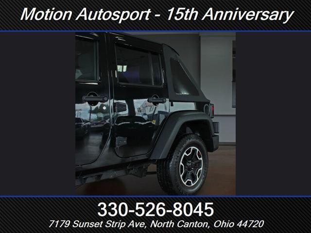 Photo of 2013 Black Clear Coat Jeep Wrangler Unlimited