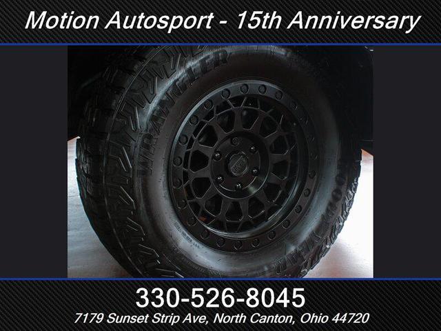 Photo of 2020 Diamond Black Crystal Pearl Coat RAM 1500