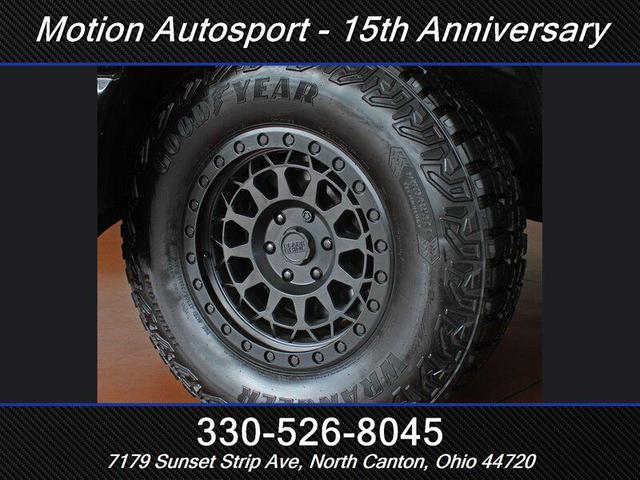 Photo of 2020 Diamond Black Crystal Pearl Coat RAM 1500