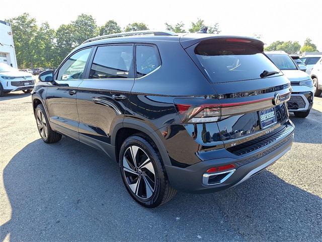 Photo of 2025 Deep Black Pearl Volkswagen Taos