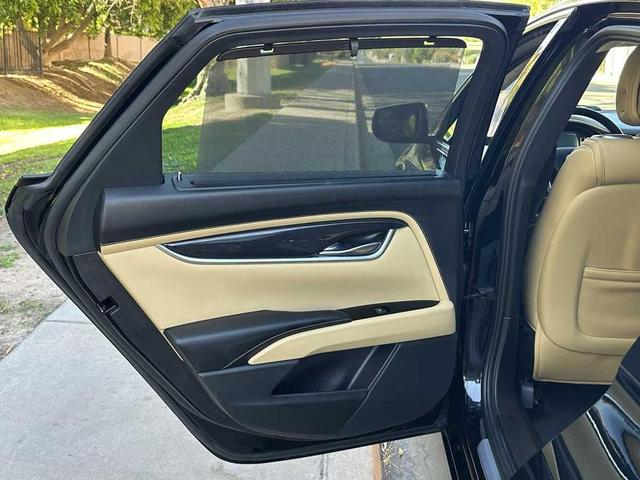 Photo of 2014 Black Raven Cadillac XTS