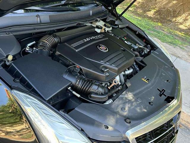 Photo of 2014 Black Raven Cadillac XTS
